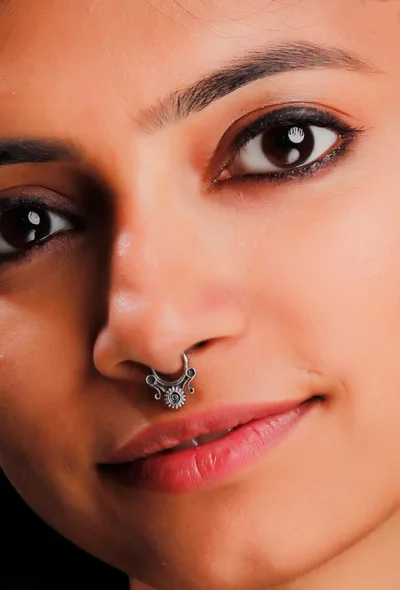 Intricate motif Brass Septum