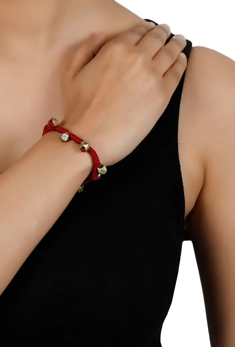 Red Embellishments German Silver Thread Bracelet