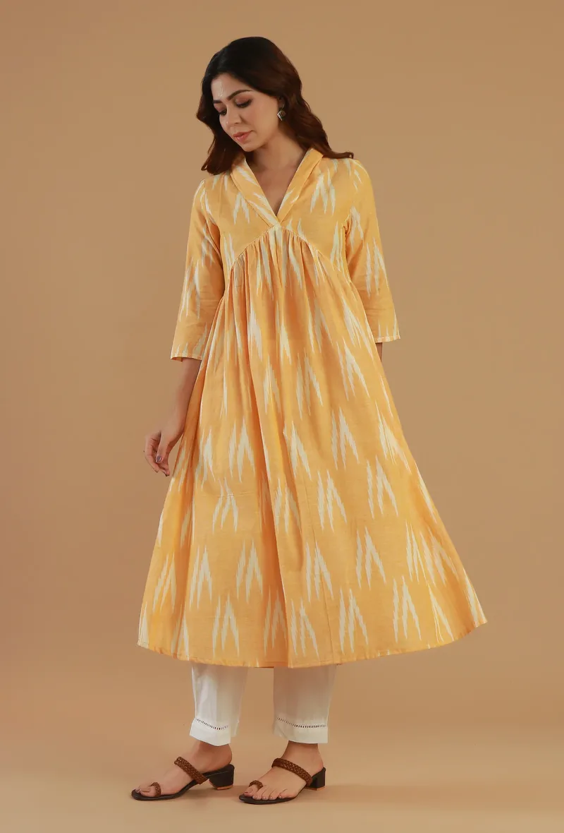 Set of 2: Yellow Ikat Cotton A-Line Kurta with White Straight Pants