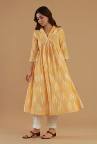 Set of 2: Yellow Ikat Cotton A-Line Kurta with White Straight Pants image 1