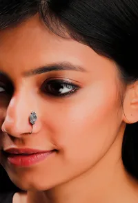 Intricate Brass Circular motif Nose Pin image 1