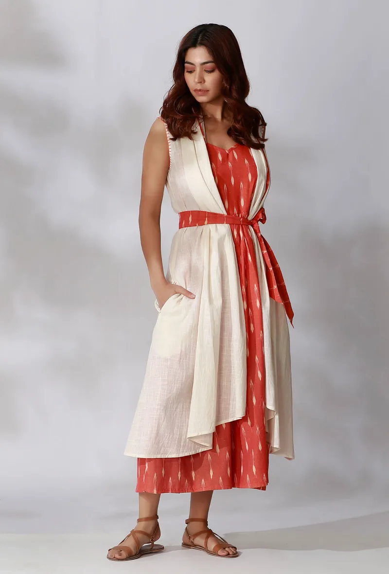 Off White Sleeveless Shrug With Orange Ikkat Detailing And Orange Ikkat Belt