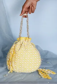 Lemon Yellow Chikankari Georgette Potli image 1