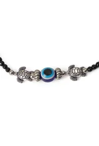 Pair of German Silver Anklets with Tortoise Charm, Evil Eye, and Black Beads image 3