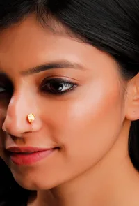 Fish Shaped Intricate Motif Nosepin in Gold Brass image 1