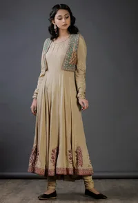 Beige Raw Silk Block Printed Jacket With An Embroidered lace Attached to It image 1