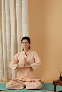 Set Of 2: Mulmul Cotton Peach Bandhgala Kurta And Straight Fit Pants image 1