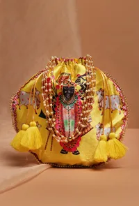 Radiant Yellow Shreenath Potli With Tassel image 1